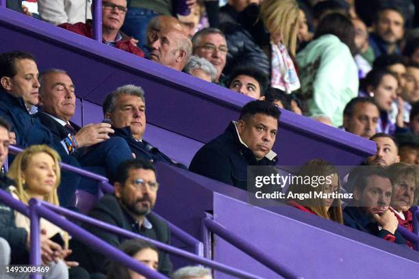 Joan Laporta, President of FC Barcelona and Ronaldo Nazario, owner of Real Valladolid CF look on from the stands during the LaLiga Santander match...