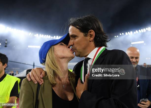 Simone Inzaghi, Head Coach of FC Internazionale, kisses his wife after victory in the Coppa Italia Final match between ACF Fiorentina and FC...