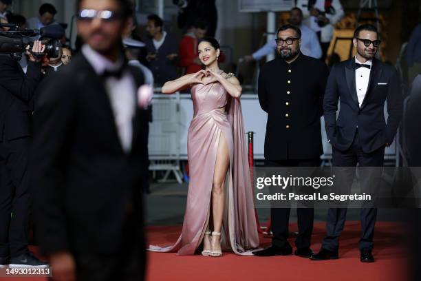 Sunny Leone, Director Anurag Kashyap and Rahul Bhat attend the "Kennedy" red carpet during the 76th annual Cannes film festival at Palais des...