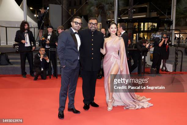 Rahul Bhat, Director Anurag Kashyap and Sunny Leone attend the "Kennedy" red carpet during the 76th annual Cannes film festival at Palais des...