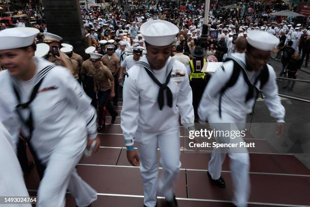 Service men and women gather in Times Square for a group photo during the start of the 35th annual Fleet Week on May 24, 2023 in New York City. Nine...