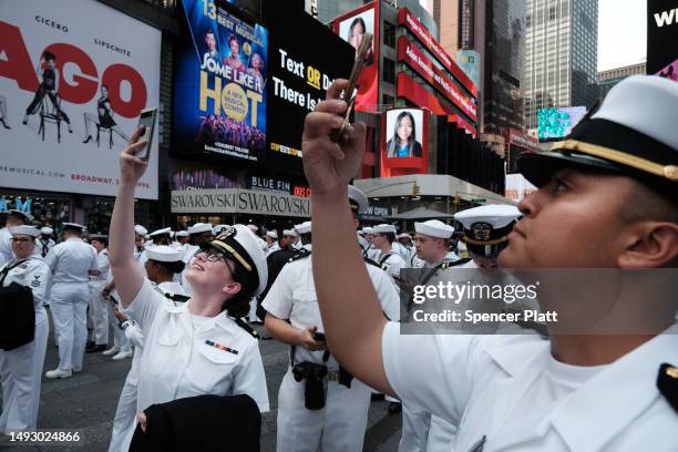 Service men and women gather in Times Square for a group photo during the start of the 35th annual Fleet Week on May 24, 2023 in New York City. Nine...