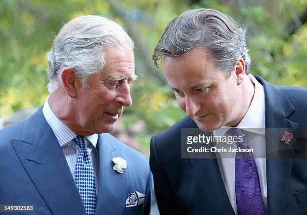 Prime Minister David Cameron and Prince Charles, Prince of Wales chat during a reception for delegates of the Global Investment Conference in...