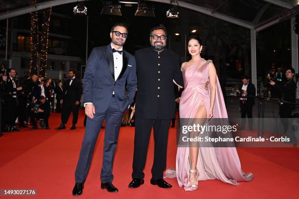 Rahul Bhat, Director Anurag Kashyap and Sunny Leone attend the "Kennedy" red carpet during the 76th annual Cannes film festival at Palais des...