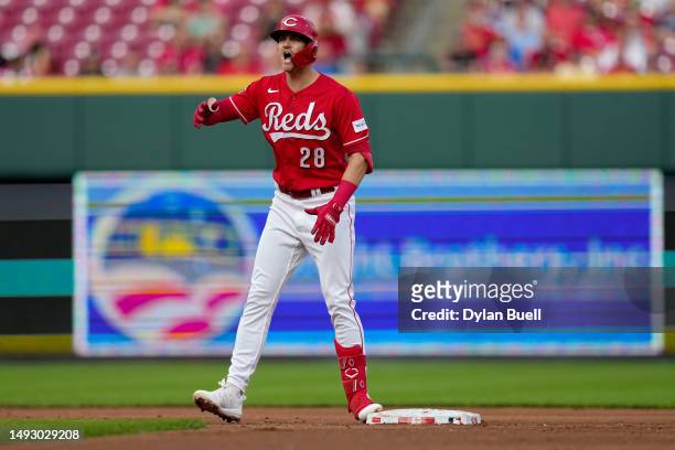 Kevin Newman of the Cincinnati Reds celebrates after hitting a double in the first inning against the St. Louis Cardinals at Great American Ball Park...