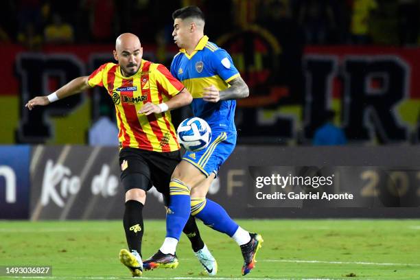 Maicol Medina of Deportivo Pereira vies for the ball with Martin Payero of Boca Juniors during the Copa CONMEBOL Libertadores 2023 group F match...