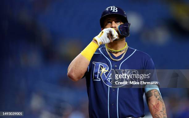 Jose Siri of the Tampa Bay Rays is congratulated after hitting a home run in the third inning during a game at Tropicana Field on May 24, 2023 in St...
