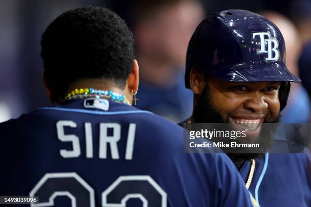 Manuel Margot of the Tampa Bay Rays is congratulated after scoring a run in the fourth inning during a game against the Toronto Blue Jays at...