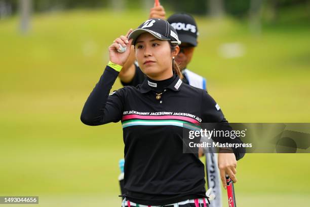 Momoko Osato of Japan acknowledges the gallery on the 3rd green during the first round of resorttrust Ladies at Grandy Hamanako Golf Club on May 25,...