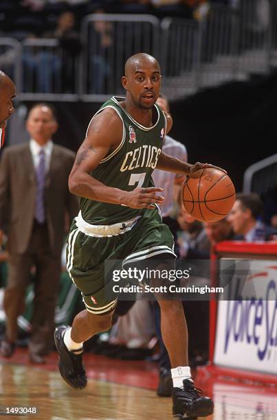 Point guard Kenny Anderson of the Boston Celtics dribbles the ball during the NBA game against the Atlanta Hawks at Philips Arena in Atlanta,...