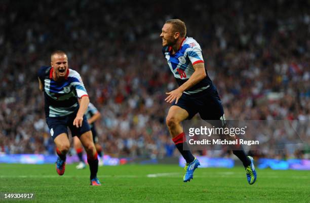 Craig Bellamy of Great Britain celebrates scoring to make it 1-0 during the Men's Football first round Group A Match of the London 2012 Olympic Games...