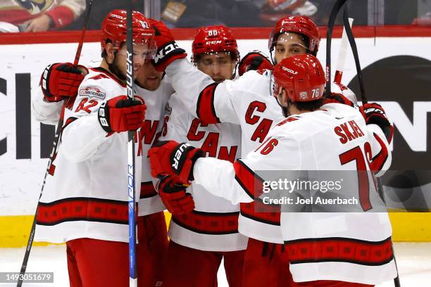 Teuvo Teravainen of the Carolina Hurricanes celebrates with his teammates after scoring a goal on Sergei Bobrovsky of the Florida Panthers during the...