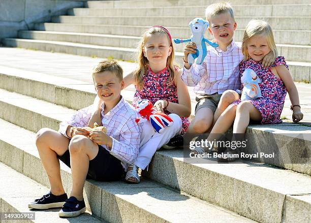 Prince Gabriel, Princess Elisabeth, Prince Emmanuel and Princess Eleonore of Belgium pose for a photo during a visit to central London on July 26,...