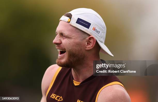 Blake Hardwick of the Hawks laughs during a Hawthorn Hawks AFL training session at Waverley Park on May 25, 2023 in Melbourne, Australia.