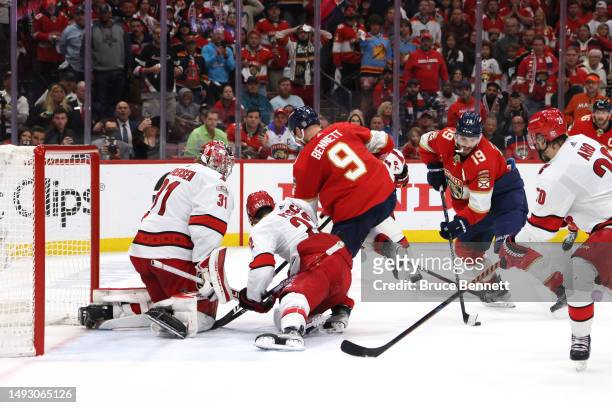 Matthew Tkachuk of the Florida Panthers shoots the puck to score the game winning goal on Frederik Andersen of the Carolina Hurricanes during the...