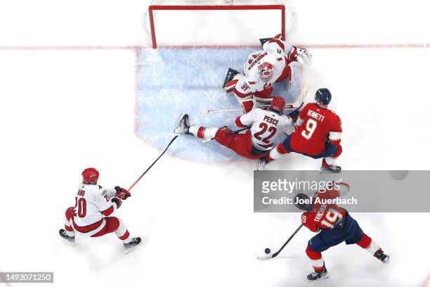 Matthew Tkachuk of the Florida Panthers shoots to score the game winning goal on Frederik Andersen of the Carolina Hurricanes during the third period...