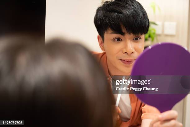 an asian female beauty consultant / aesthetic doctor is having a consultation session with an asian male client in a beauty centre. - consultation lake stock pictures, royalty-free photos & images