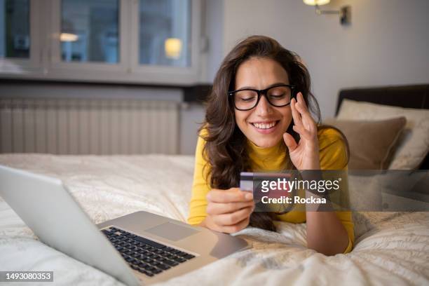 young woman enjoys online shopping