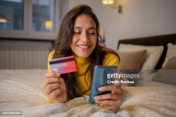 woman shopping online with credit card
