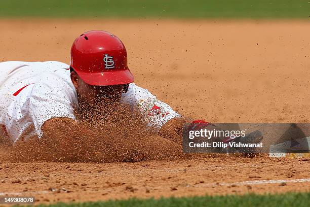 Rafael Furcal of the St. Louis Cardinals is picked off at first base against the Los Angeles Dodgers at Busch Stadium on July 26, 2012 in St. Louis,...