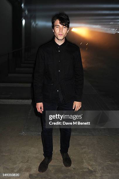 Tom Hughes arrives at the Warner Music Group Pre-Olympics Party in the Southern Tanks Gallery at the Tate Modern on July 26, 2012 in London, England.