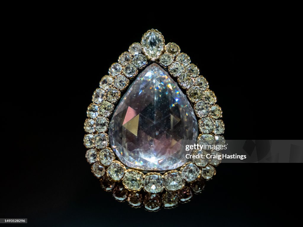 Close of Large Mega Diamond Broach Ring on a black background