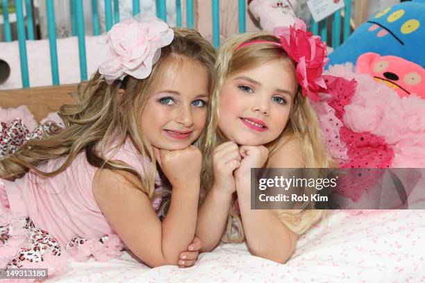 Personalities Eden Wood and Isabella Barrett attend Tiny Tots Mini Mogul Fashion event at Babestas on July 26, 2012 in New York City.