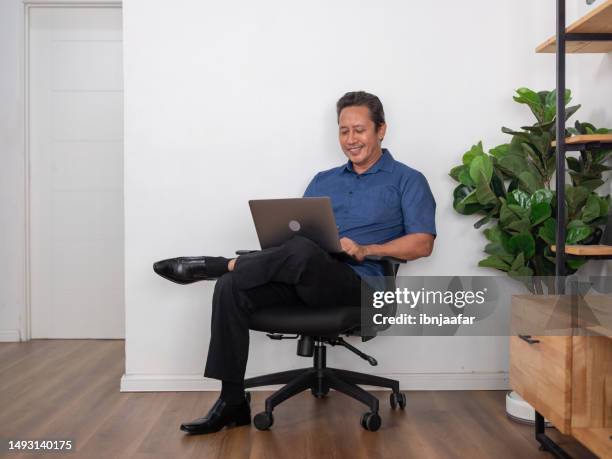 senior people sitting on chair - succession planning stock pictures, royalty-free photos & images