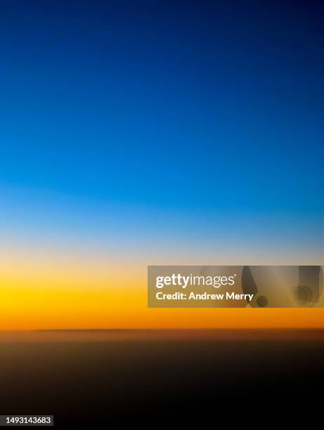 dark blue to orange sky dusk night - dusk stock pictures, royalty-free photos & images