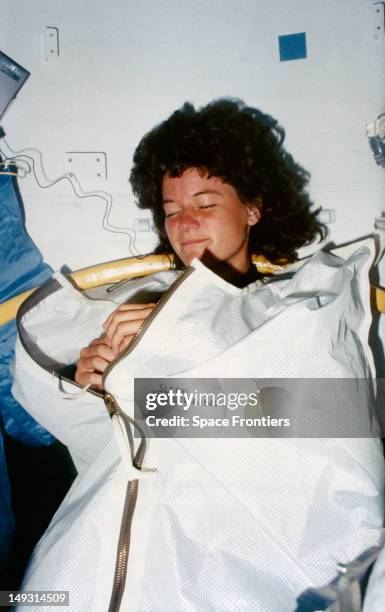 Astronaut Sally Ride in her sleep restraint during the STS-7 mission on the space shuttle Challenger, June 1983. On this mission she became the first...