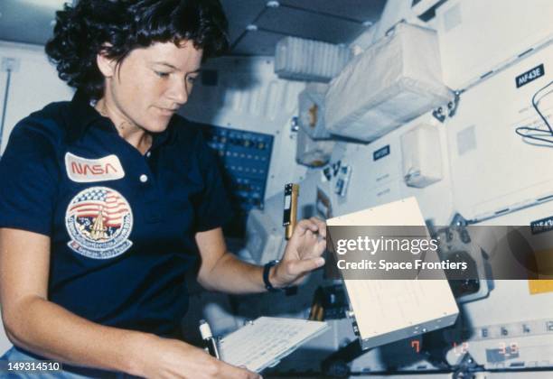 Astronaut Sally Ride in the interior of the Challenger space shuttle during the STS-41-G mission, October 1984. In 1983 she became the first American...