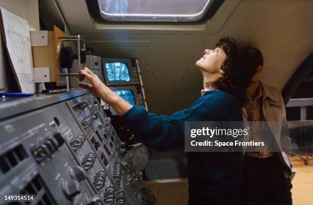 Astronaut Sally Ride trains in the Manipulator Development Facility of the mockup and integration laboratory at the Johnson Space Center, Houston,...