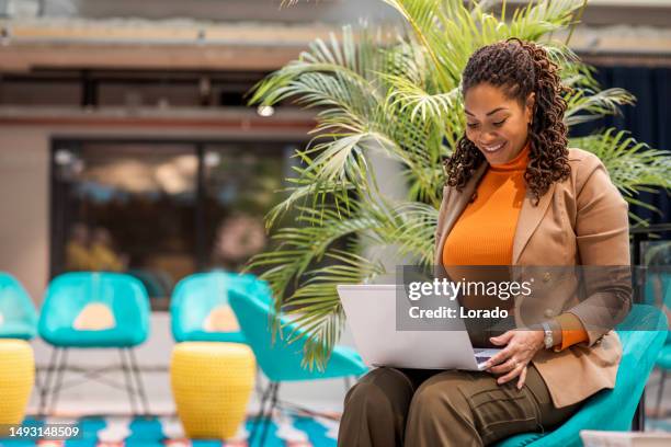 beautiful diverse woman using an ai chatbot - chatbot stock pictures, royalty-free photos & images