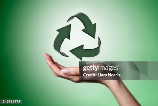 Hand Reycle Hand Holding Recycle Symbol High-Res Stock Photo - Getty Images