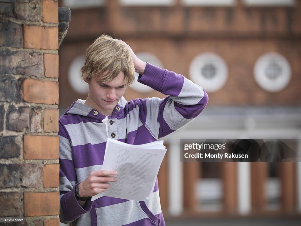 Student receiving unsuccessful exam results at school