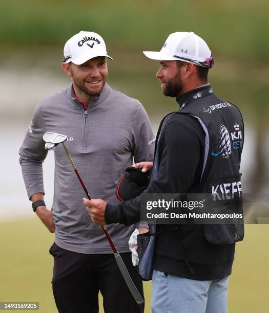 Maximilian Kieffer of Germany is pictured with his caddie on the 17th hole during Day One of the KLM Open at Bernardus Golf on May 25, 2023 in...