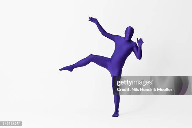 man in bodysuit posing - bodysuit stock pictures, royalty-free photos & images