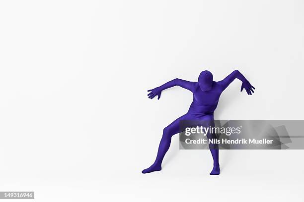 man in bodysuit posing - zentai bodysuit stock pictures, royalty-free photos & images