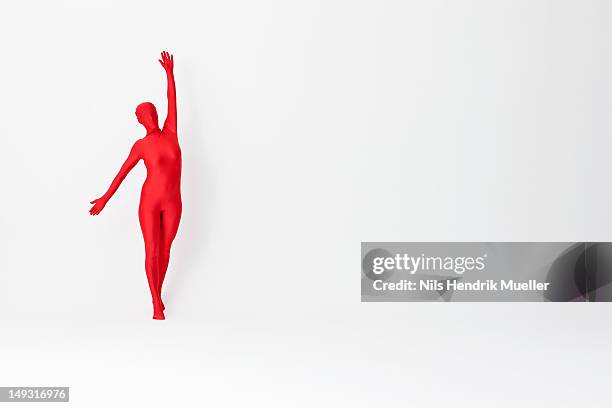 woman in bodysuit posing - bodysuit stock pictures, royalty-free photos & images