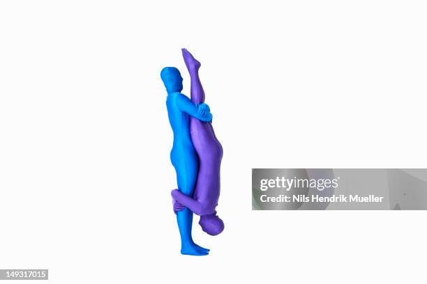 men in bodysuits making the letter i - zentai bodysuit stock pictures, royalty-free photos & images