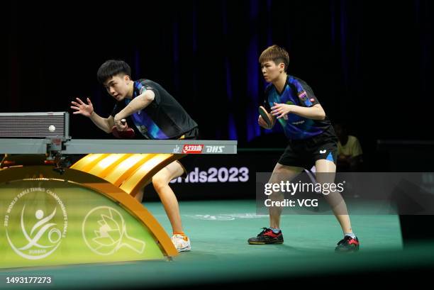 Lin Yun-ju and Chen Szu-yu of Chinese Taipei compete in the Mixed Doubles quarter-final match against Wang Chuqin and Sun Yingsha of China on day 5...