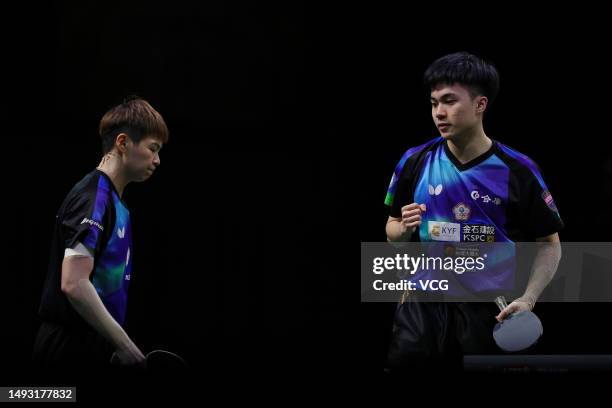 Lin Yun-ju and Chen Szu-yu of Chinese Taipei react in the Mixed Doubles quarter-final match against Wang Chuqin and Sun Yingsha of China on day 5 of...