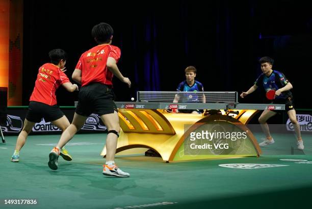 Lin Yun-ju and Chen Szu-yu of Chinese Taipei compete in the Mixed Doubles quarter-final match against Wang Chuqin and Sun Yingsha of China on day 5...