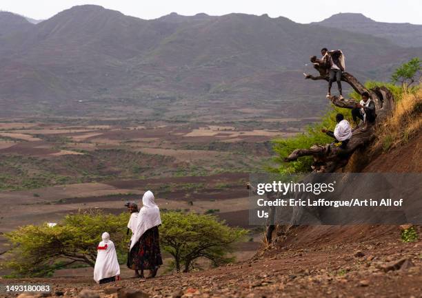 Ethiopian people in front of a landscape, Amhara Region, Lalibela, Ethiopia on May 1, 2023 in Lalibela, Ethiopia.