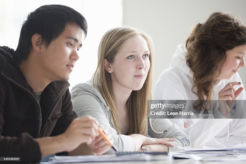 Students sitting at desk in class