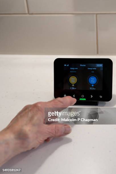 home smart meter for electricity and gas used in domestic kitchen - slimme meter stockfoto's en -beelden