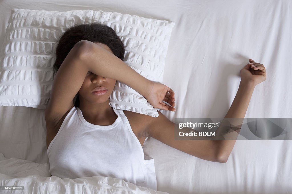 Woman sleeping in bed