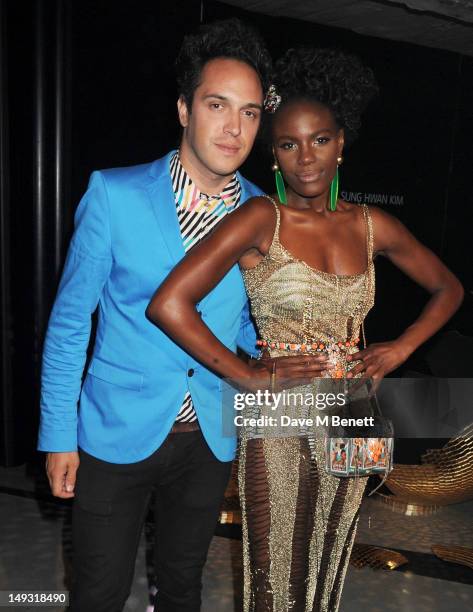 Dan Smith and Shingai Shoniwa attend the Warner Music Group Pre-Olympics Party in the Southern Tanks Gallery at the Tate Modern on July 26, 2012 in...