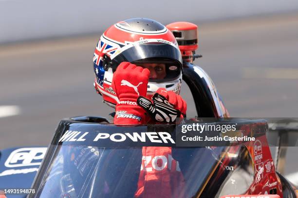 Will Power, driver of the Verizon Team Penske Chevrolet, gets out of his car after practice of the 107th Running of the Indianapolis 500 at...