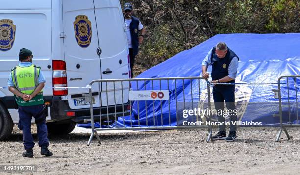 Portuguese police investigators dismantle base camp at the end of the three-day search for remains of Madeleine McCann at Barragem do Arade Reservoir...